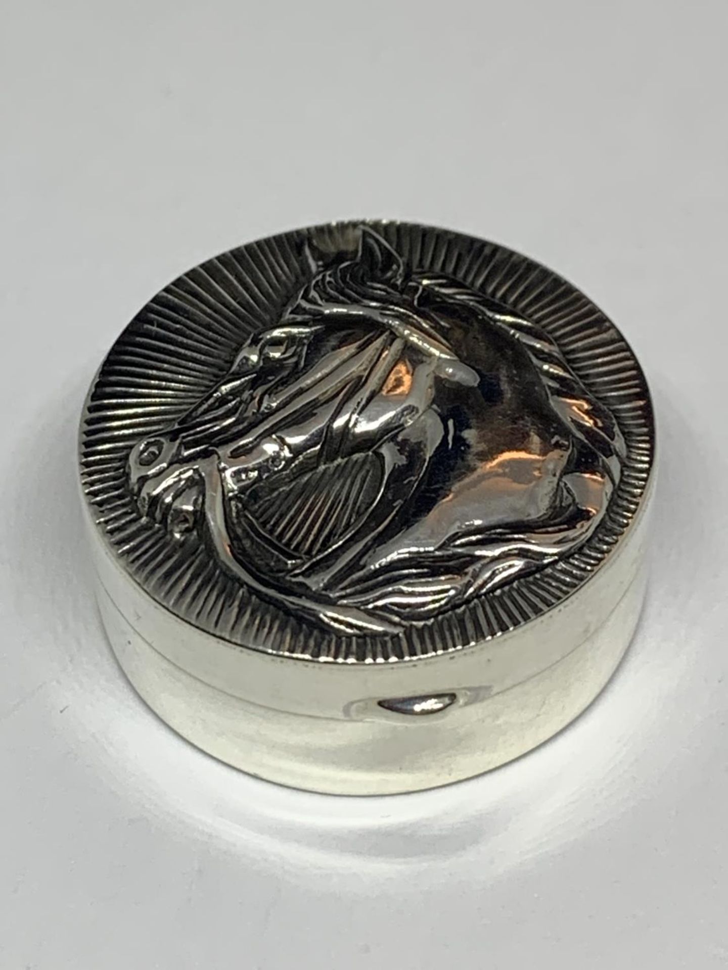 A MARKED SILVER HORSE PILL BOX