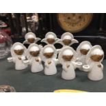 NINE CERAMIC ANGEL CANDLE HOLDERS