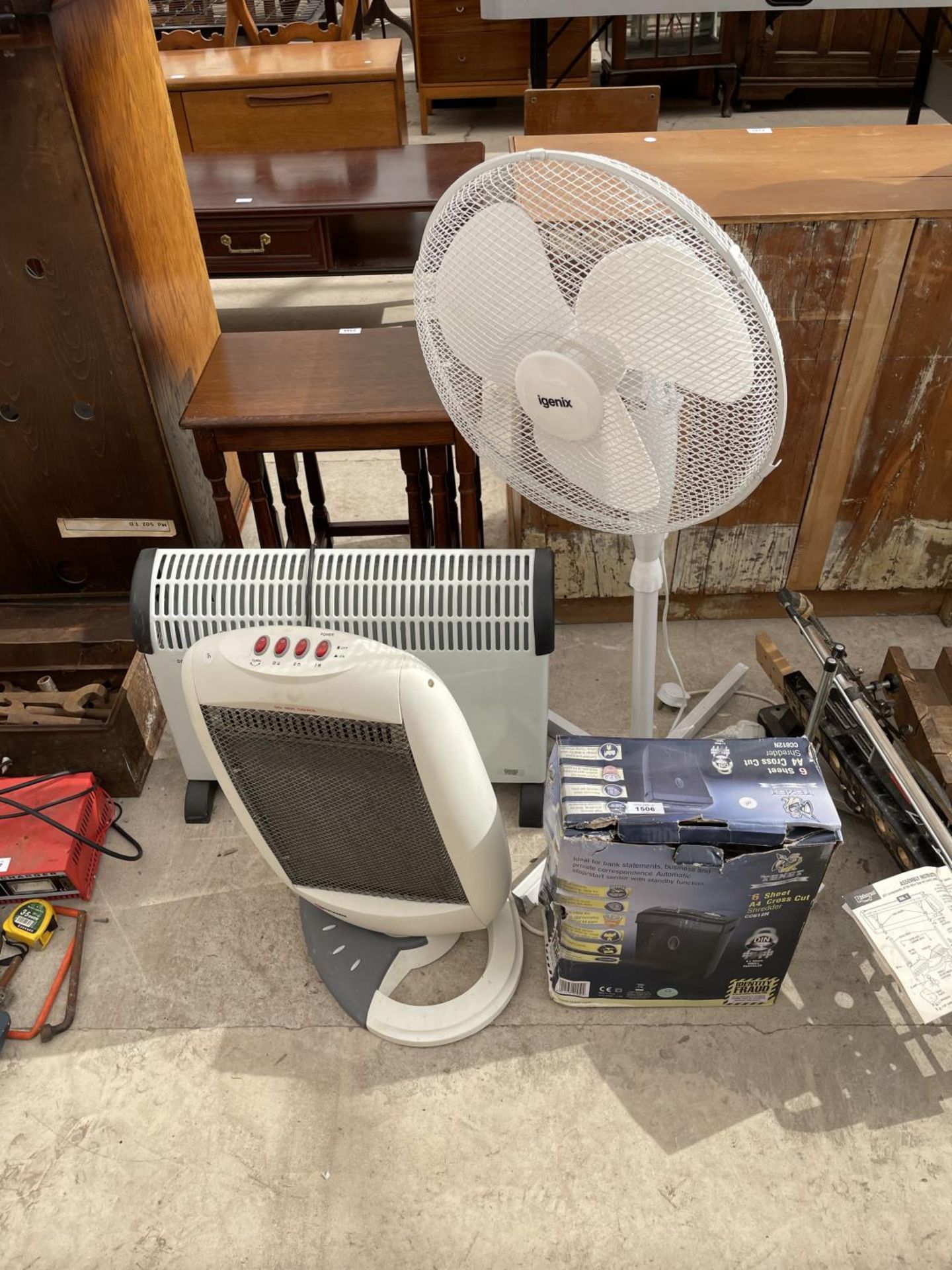 AN ASSORTMENT OF ELECTRIC FANS AND HEATERS