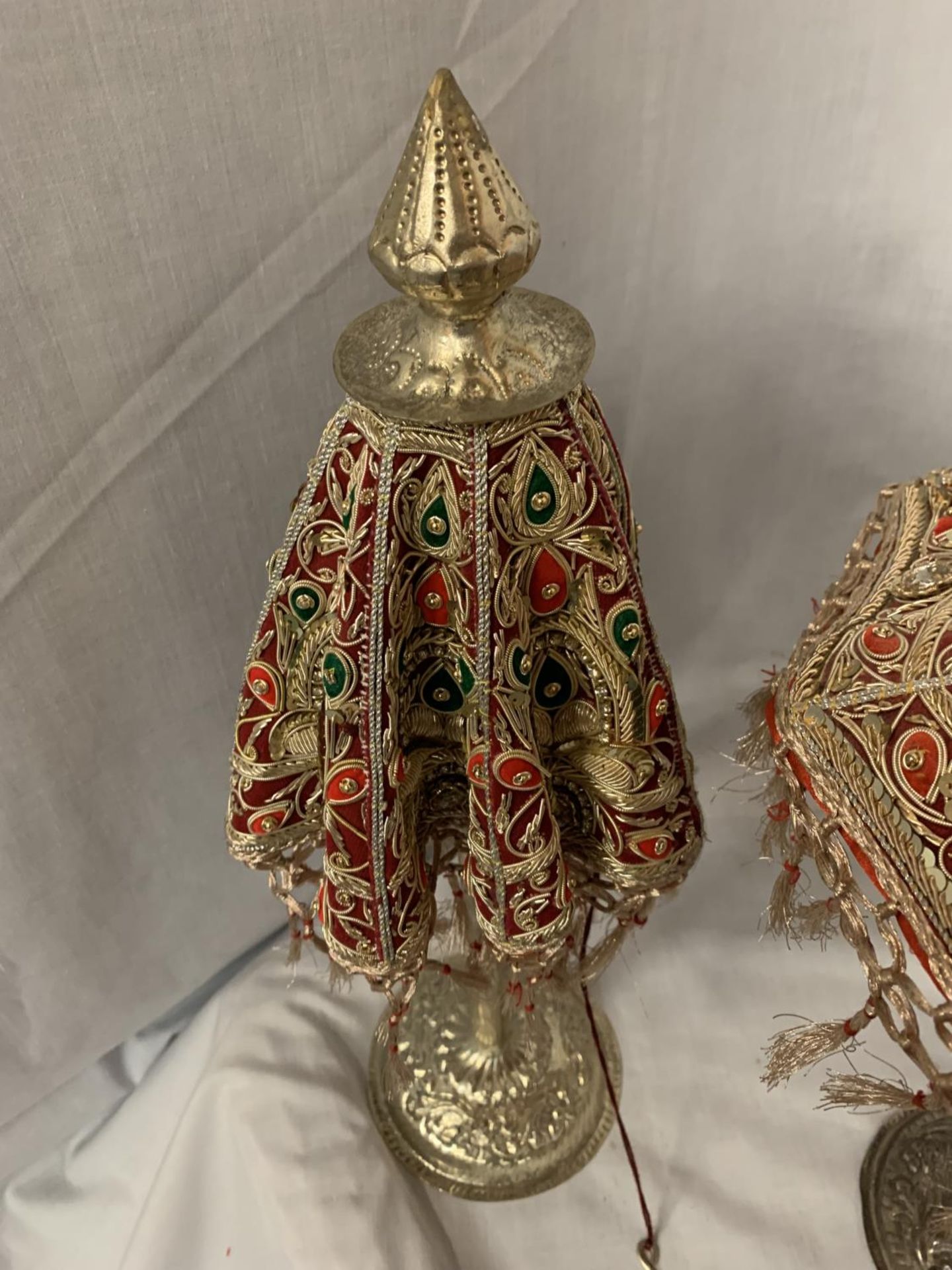 TWO METAL BASED HIGHLY DECORATIVE INDIAN ORNAMENTS IN THE STYLE OF UMBRELLAS WITH GEM, SEQUIN AND - Image 3 of 3