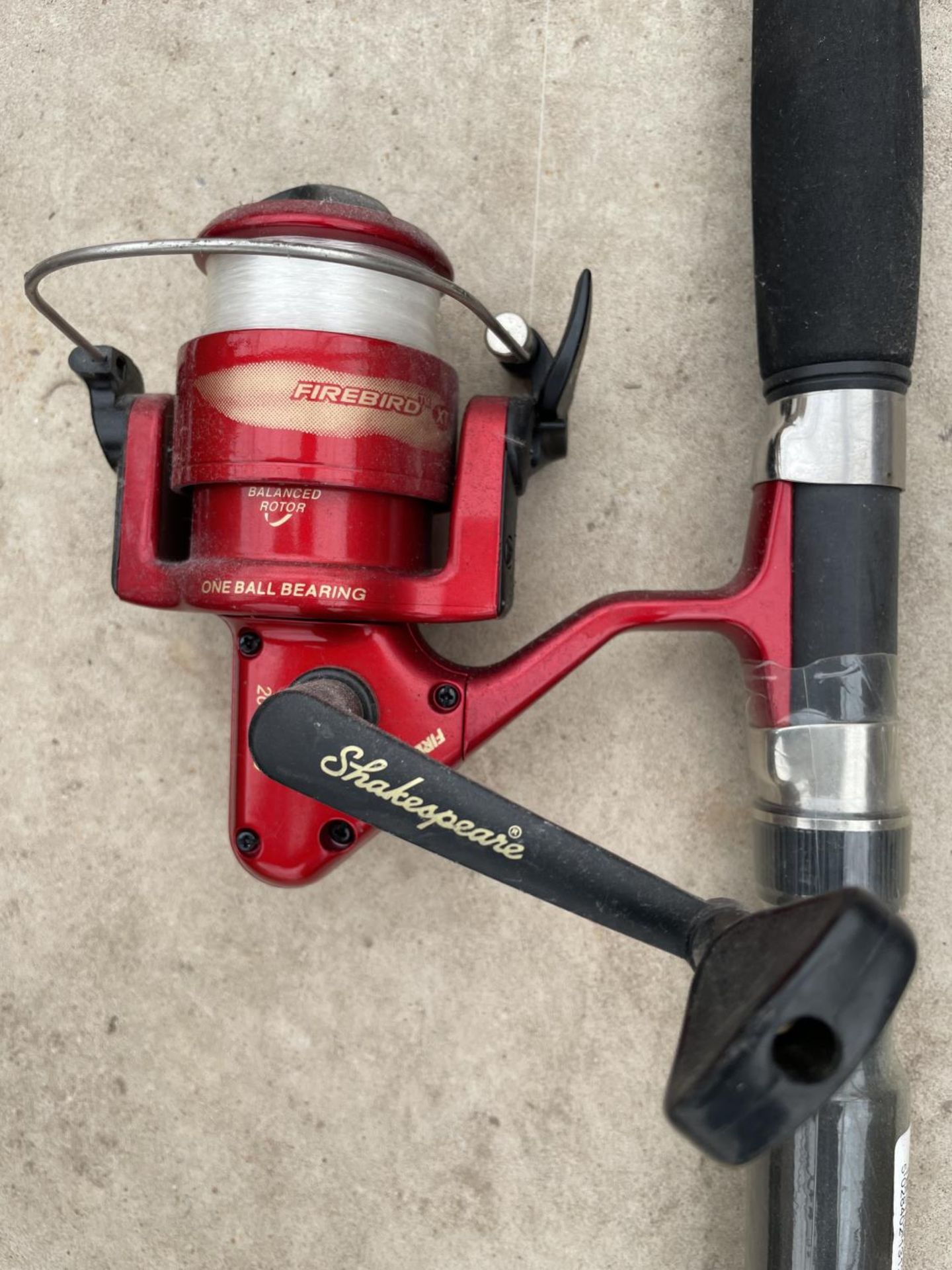 TWO MODERN FISHING RODS, ONE WITH A REEL - Image 2 of 3