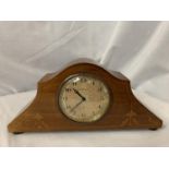 AN EIGHT DAY SWISS MOVEMENT MANTEL CLOCK WITH WOODEN BALL FEET AND PALM TREE INLAY DESIGN