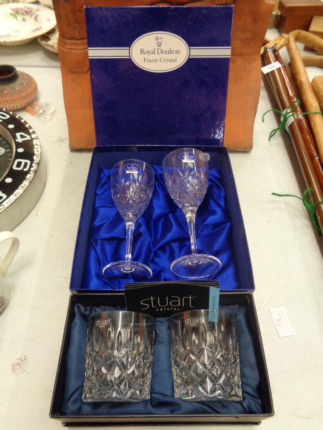 A SELECTION OF BOXED CRYSTALWARE GLASSES TO INCLUDE TWO "ROYAL DOULTON WINE GLASSES " AND TWO "
