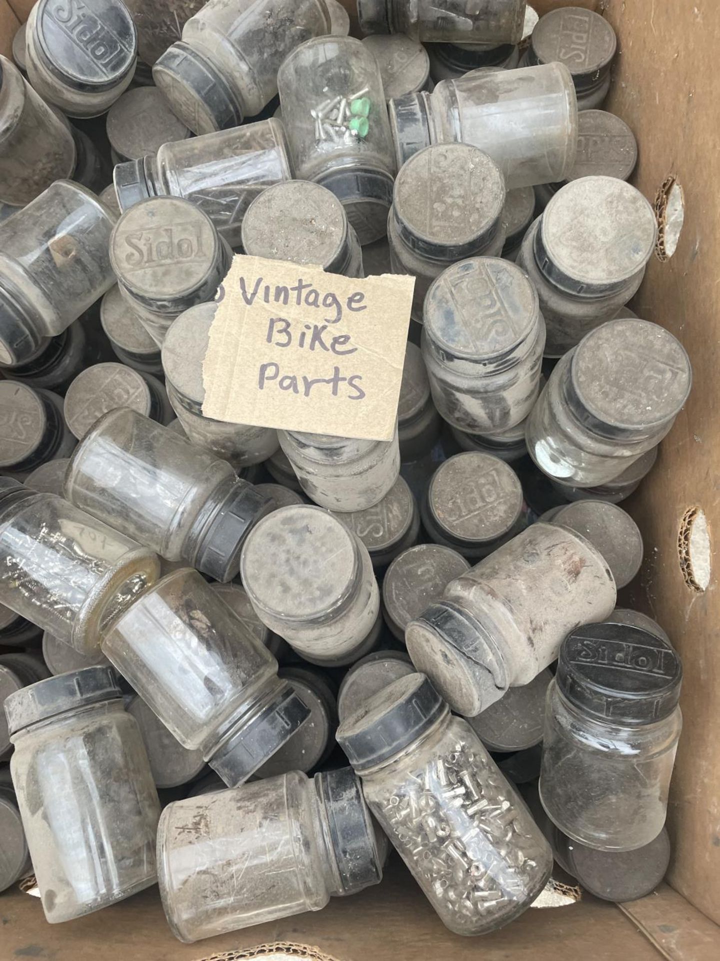 A LARGE QUANTITY OF GLASS JARS CONTAINING HARDWARE AND BIKE PARTS ETC - Image 2 of 2