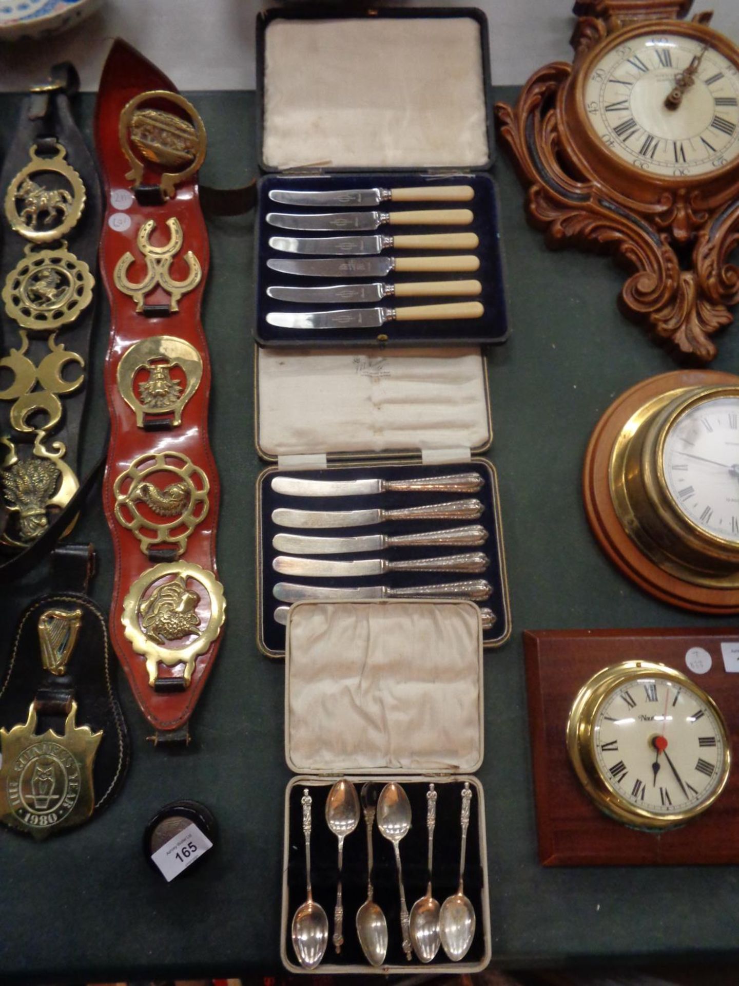 A COLLECTION OF THREE BOXED CUTLERY ITEMS INCLUDING TWELVE KNIVES AND SIX SPOONS