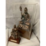 A COPPER PLATED BUDDHA FIGURE ON WOODEN BASE IN PLASTIC CASE 46CM X 25CM WITH FURTHER COPPER