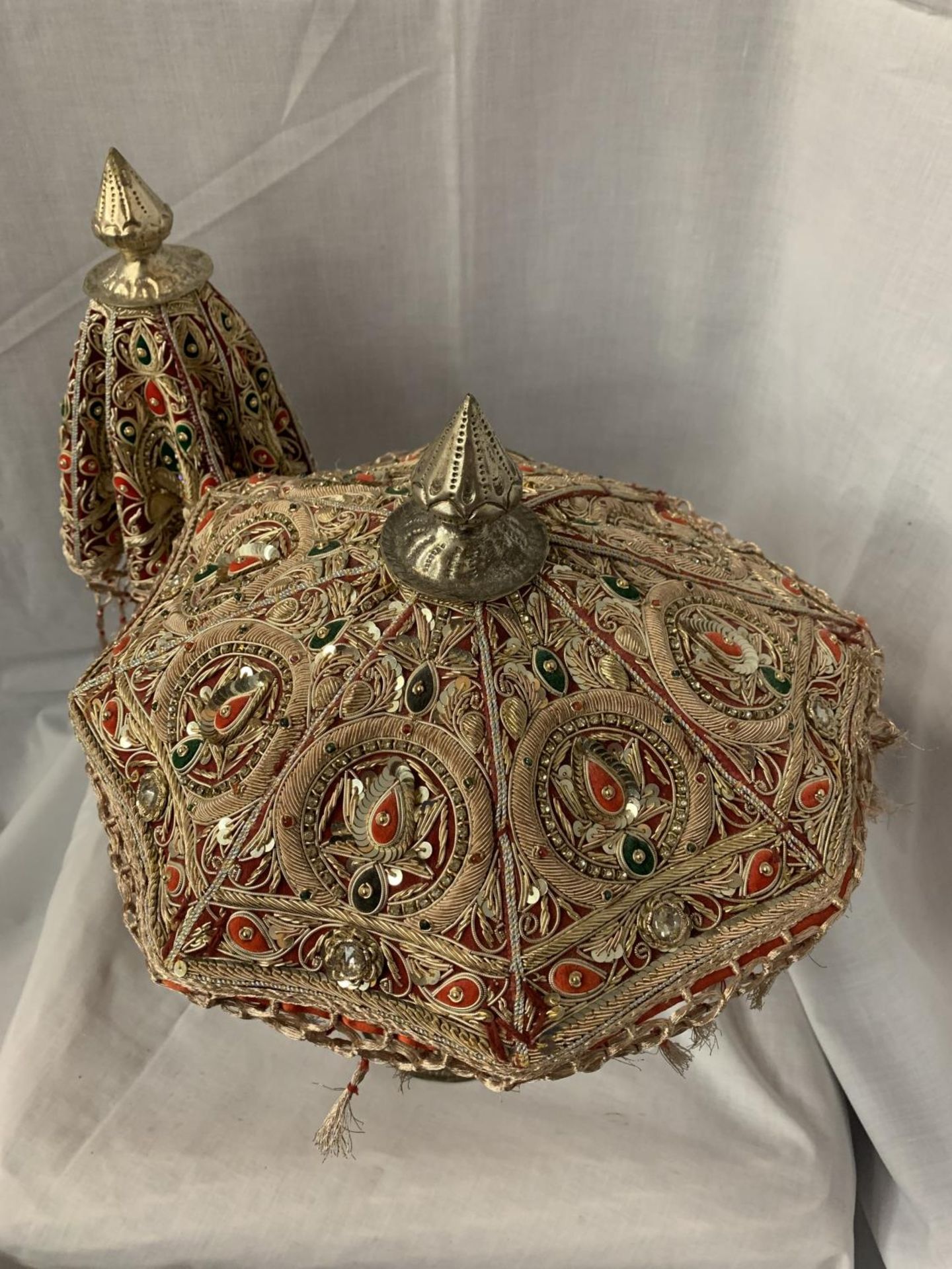 TWO METAL BASED HIGHLY DECORATIVE INDIAN ORNAMENTS IN THE STYLE OF UMBRELLAS WITH GEM, SEQUIN AND - Image 2 of 3