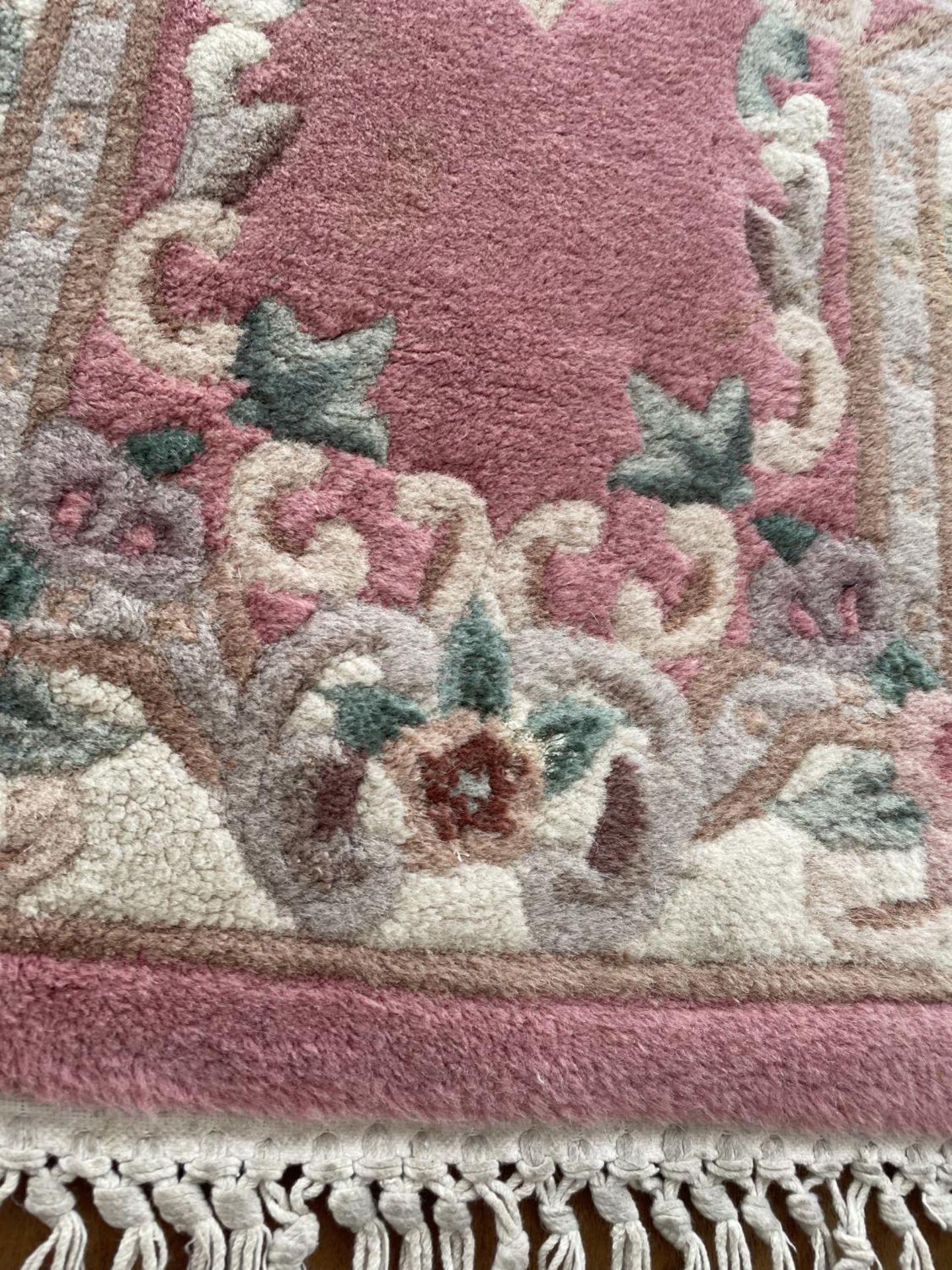 A SMALL PINK PATTERNED RUG - Image 2 of 2