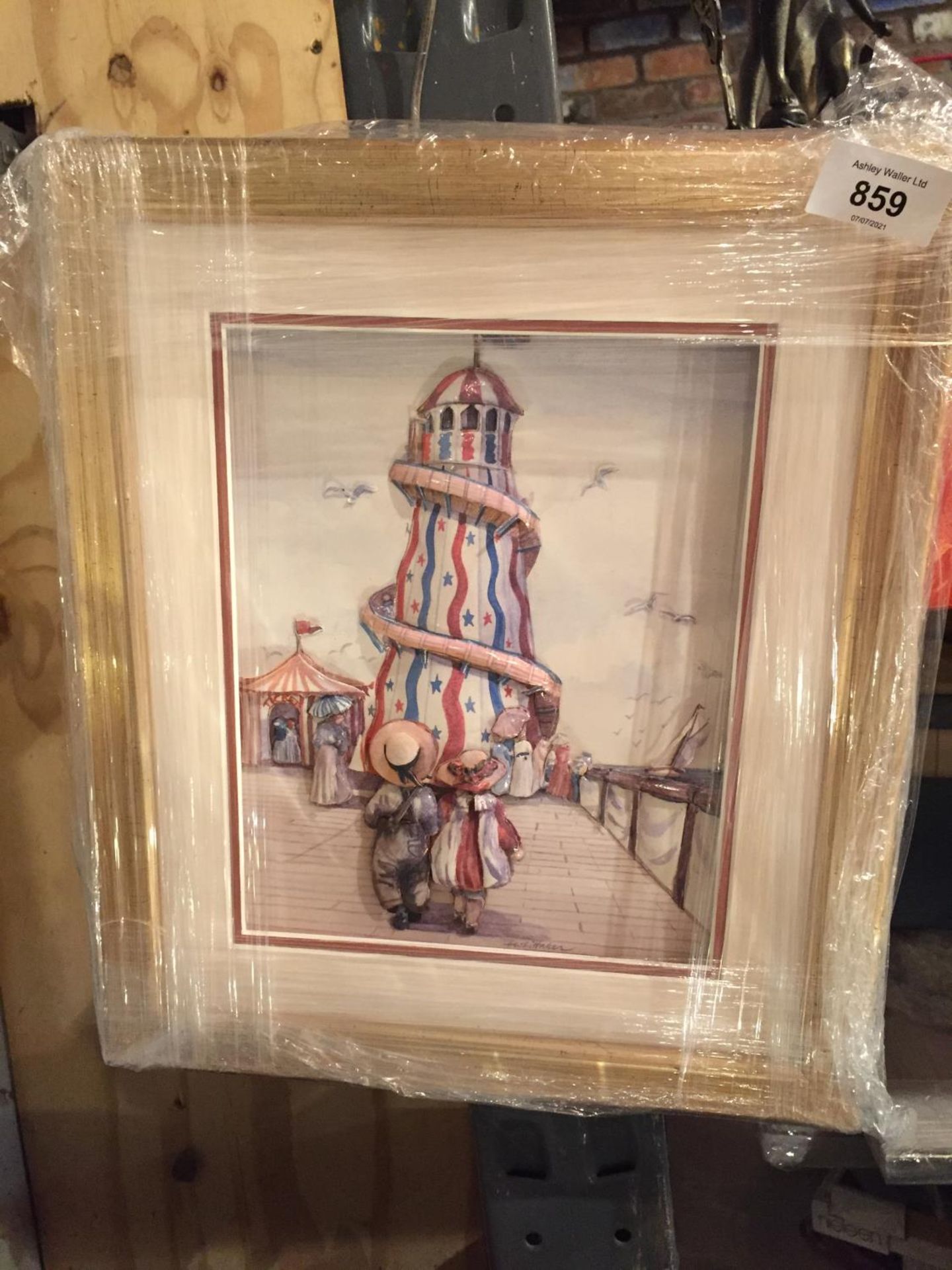 A FRAMED 3D PICTURE OF CHILDREN AT A FAIRGROUND