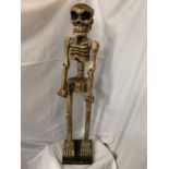 A TALL WOODEN CARVED SKELETON FIGURINE H:114CM