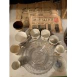 TWO VINTAGE NEWSPAPERS AND A SELECTION OF SOUVENIR MUGS AND GLASSWARE