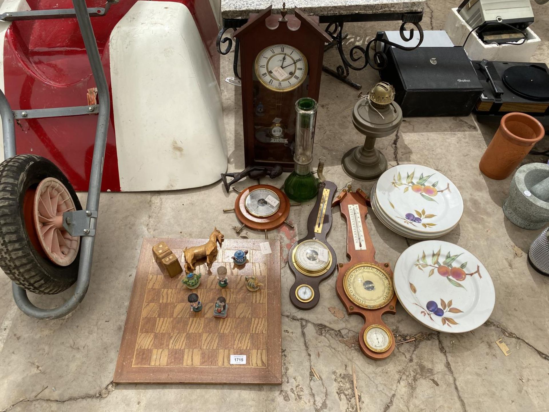 AN ASSORTMENT OF ITEMS TO INCLUDE BAROMETERS, A CHESS BOARD AND OIL LAMP ETC