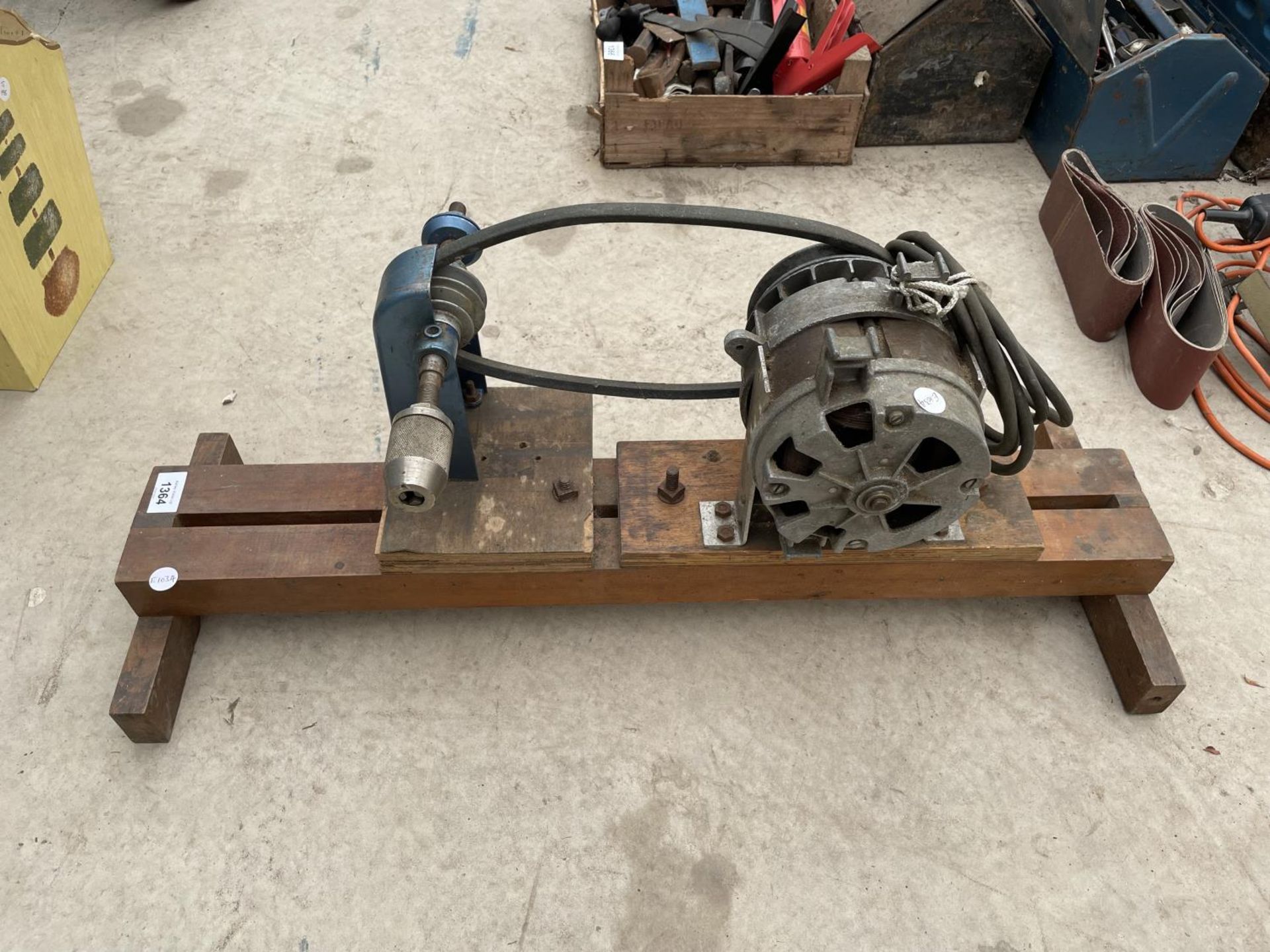 A MOTOR WITH A BELT DRIVEN DRILL