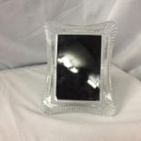 A WATERFORD CRYSTAL PHOTOGRAPH FRAME FOR A 10CM X 15CM PHOTO