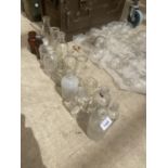 AN ASSORTMENT OF GLASS LAB BOTTLES