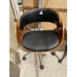 AN EAMES STYLE OFFICE SWIVEL CHAIR