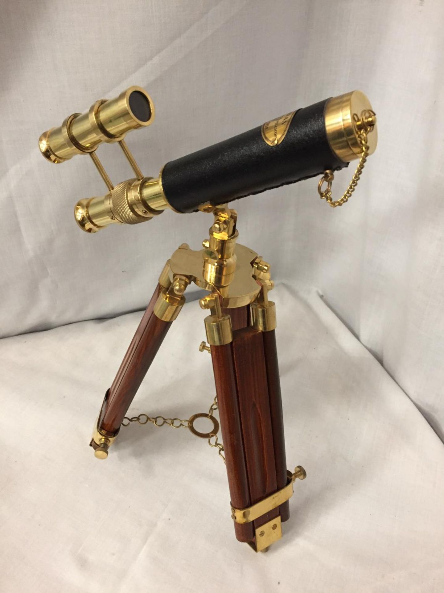 A BRASS AND LEATHER TELESCOPE ON A WOODEN TRIPOD STAND, 34CM HIGH - Image 2 of 4