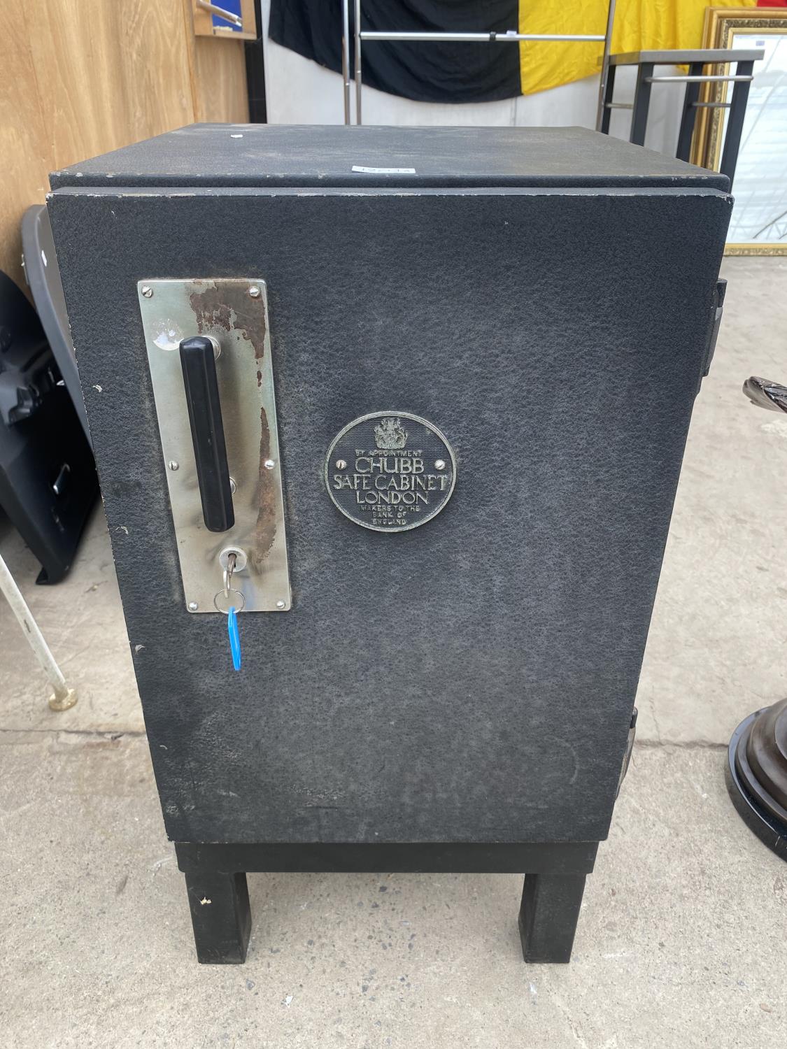 A METAL CHUBB SAFE CABINET, LONDON WITH KEY