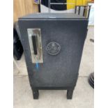 A METAL CHUBB SAFE CABINET, LONDON WITH KEY