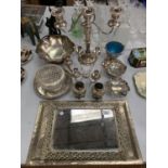 A LARGE COLLECTION OF SILVER PLATED ITEMS TO INCLUDE CANDLEABRAS, ROSE BOWL, TRAY, DECORATIVE BON
