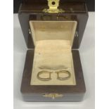 A PAIR OF 9 CARAT GOLD AND DIAMOND EARRINGS IN A PRESENTATION BOX