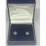 A PAIR OF 10 CARAT GOLD SAPPHIRE EARRINGS IN A PRESENTATION BOX