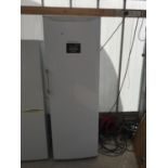 A WHITE HOTPOINT UPRIGHT FRIDGE BELIEVED IN WORKING ORDER BUT NO WARRANTY