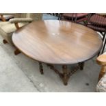 AN ERCOL TWIN-LEAF COFFEE TABLE