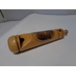 A MAUCHLINE WARE WOODEN WHISTLE