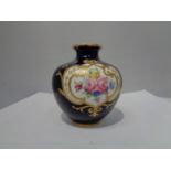 A ROYAL CROWN DERBY VASE