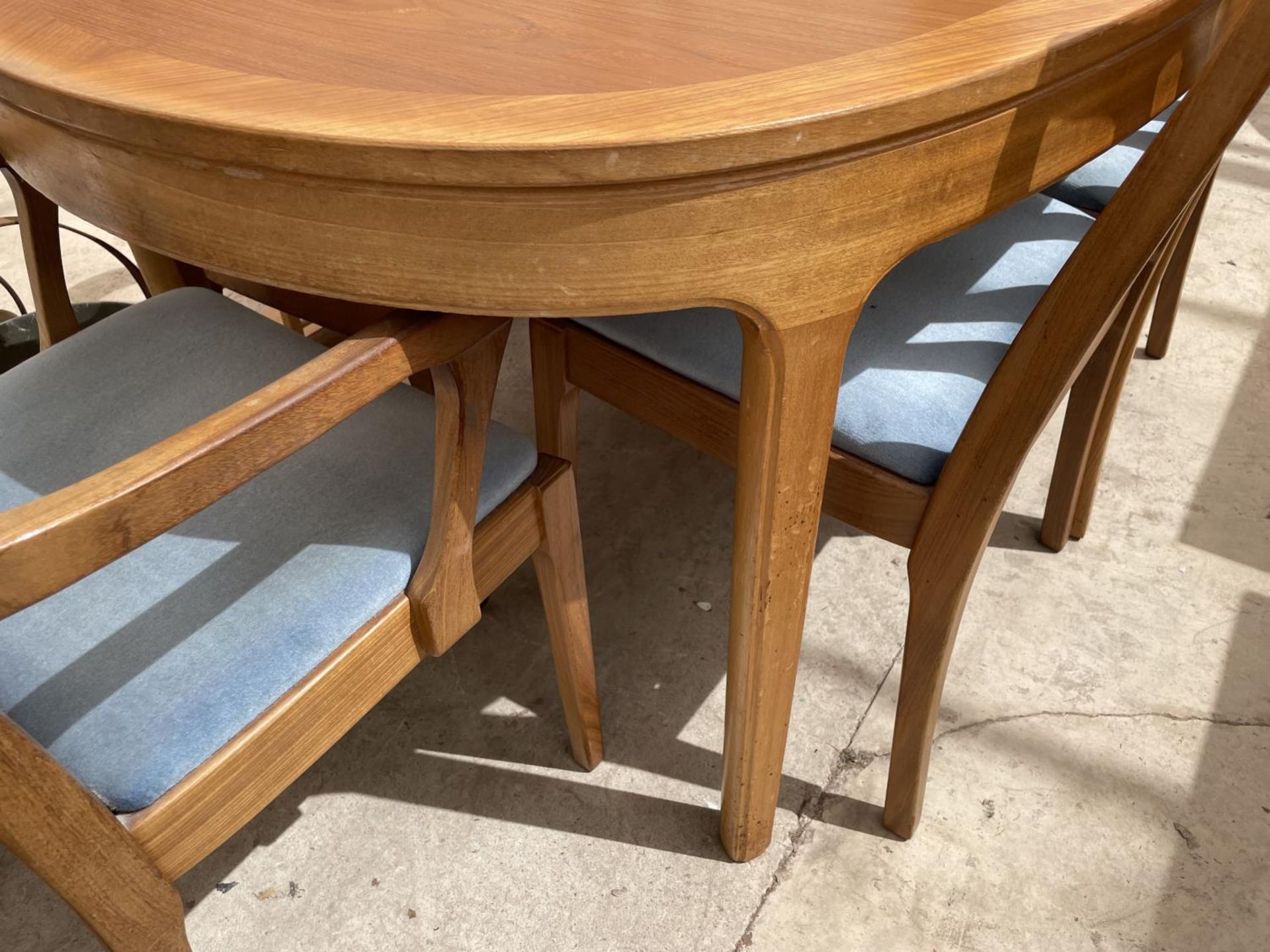 A NATHAN RETRO TEAK EXTENDING DINING TABLE WITH FOUR DINING CHAIRS AND TWO CARVERS - Image 3 of 9