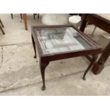 AN UNUSUAL COFFEE TABLE FORMED FROM STAINED GLASS WINDOW, ON CABRIOLE LEGS, 24" SQUARE