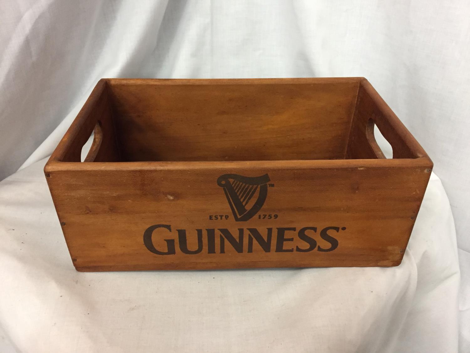 A WOODEN 'GUINNESS' BOX. LENGTH 33CM