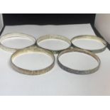 FIVE SILVER BANGLES WITH VARIOUS DESIGNS