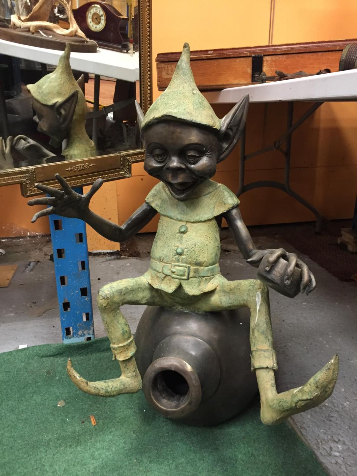 A LARGE BRONZE FIGURE OF A PIXIE