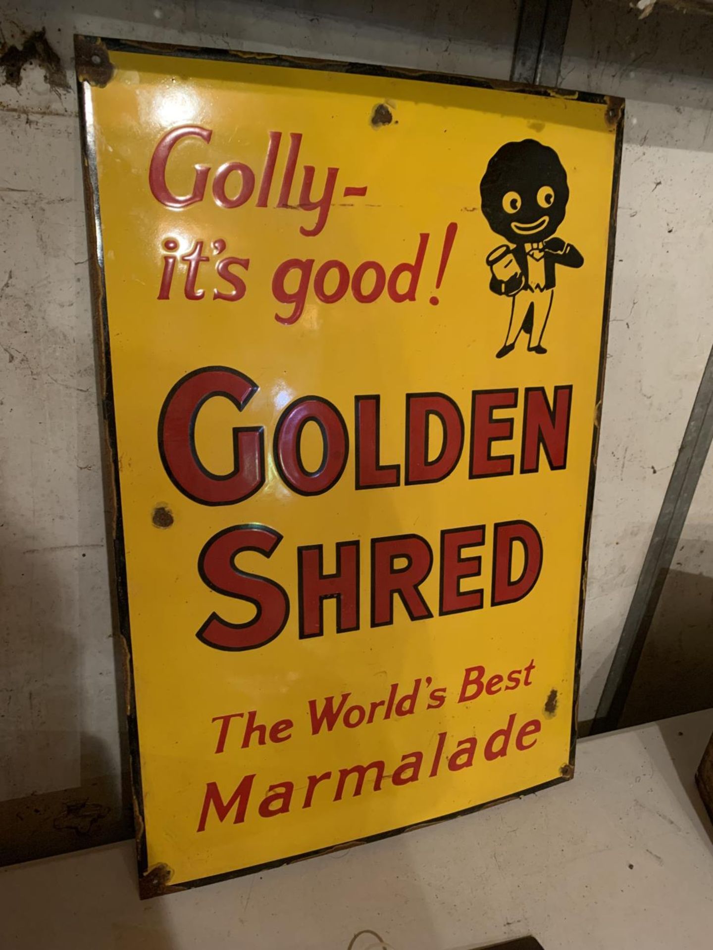 AN ENAMEL GOLDEN SHRED ADVERTISING SIGN