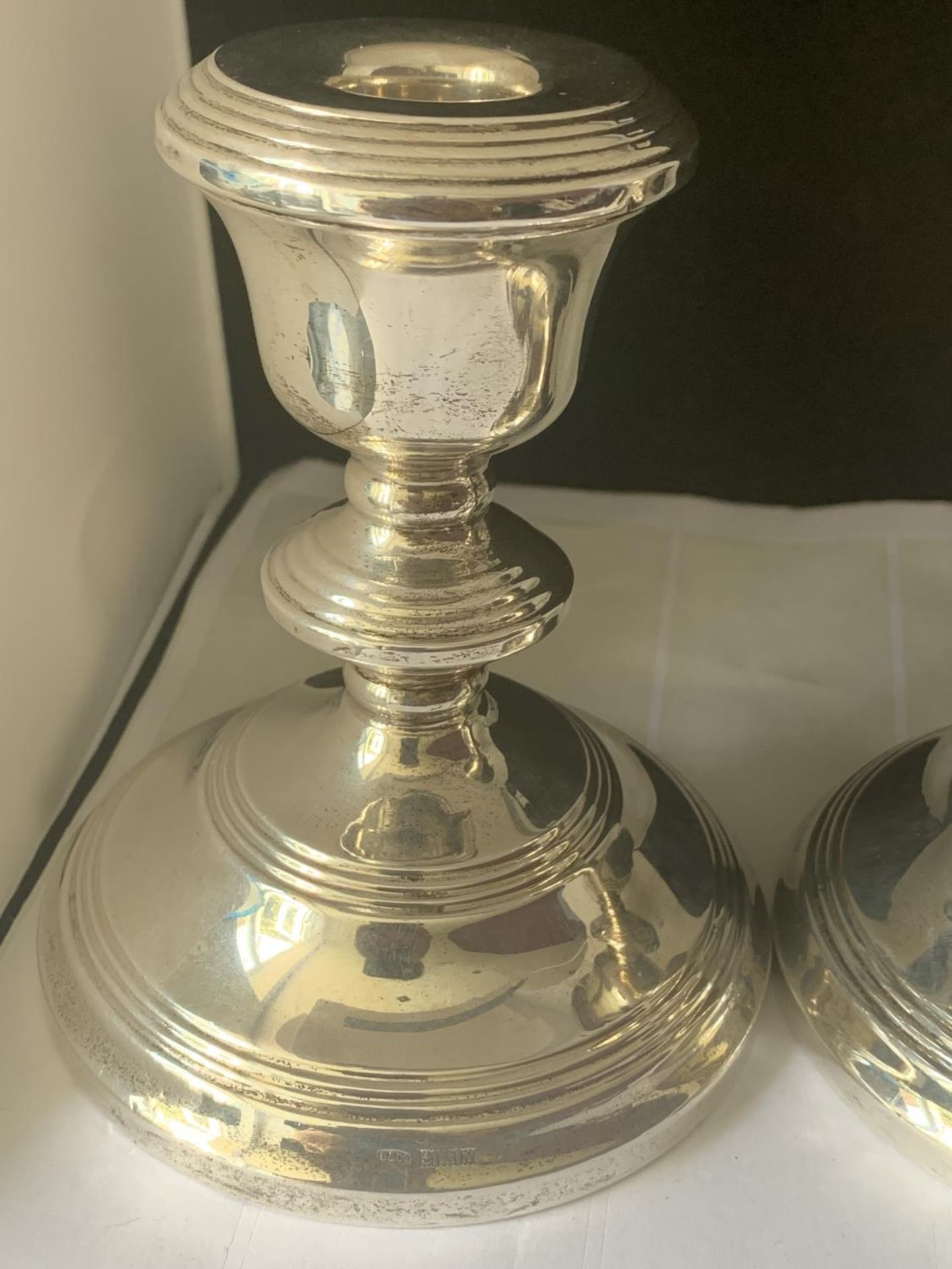 A PAIR OF HALLMARKED BIRMINGHAM SILVER WEIGHTED CANDLESTICKS - Image 2 of 4