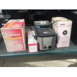 AN ASSORTMENT OF ELECTRICALS TO INCLUDE A FOOD STEAMER, A HAIR DRYER AND A HEALTH LAMP ETC