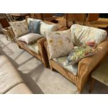 A MODERN WICKER CONSERVATORY SETTEE AND EASY CHAIR WITH FIVE LOOSE CUSHIONS