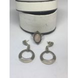 A SILVER MARCASITE RING AND EARRING SET WITH PEARLISED STONES AND A PRESENTATION BOX
