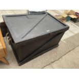 A BLACK STAINED BLANKET CHEST WITH ROPE CARRYING HANDLES, 32' WIDE