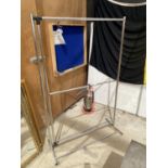 A STAINLESS STEEL TWO TIER CLOTHES RAIL