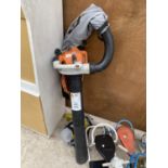 A STIHL SH56C LEAF BLOWER AND HOOVER WITH BAG