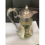A VICTORIAN ALOCK BURSLEY CERAMIC CLARET JUG WITH ORNATE SILVER PLATED TOP