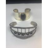 TWO HEAVY SILVER BANGLES WITH BLACK STONES