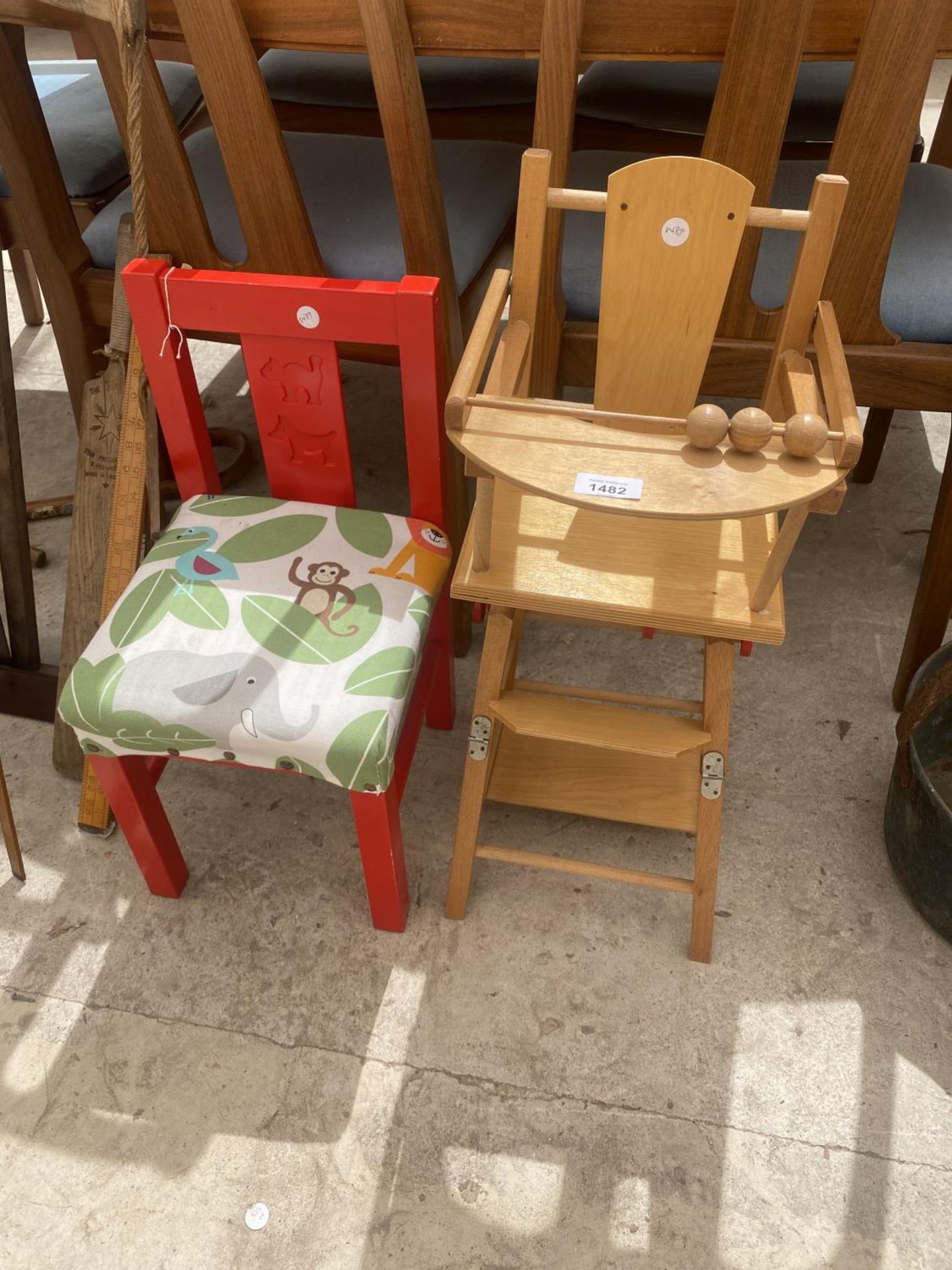 A SMALL DOLLS HIGH CHAIR AND A FURTHER CHILDRENS CHAIR