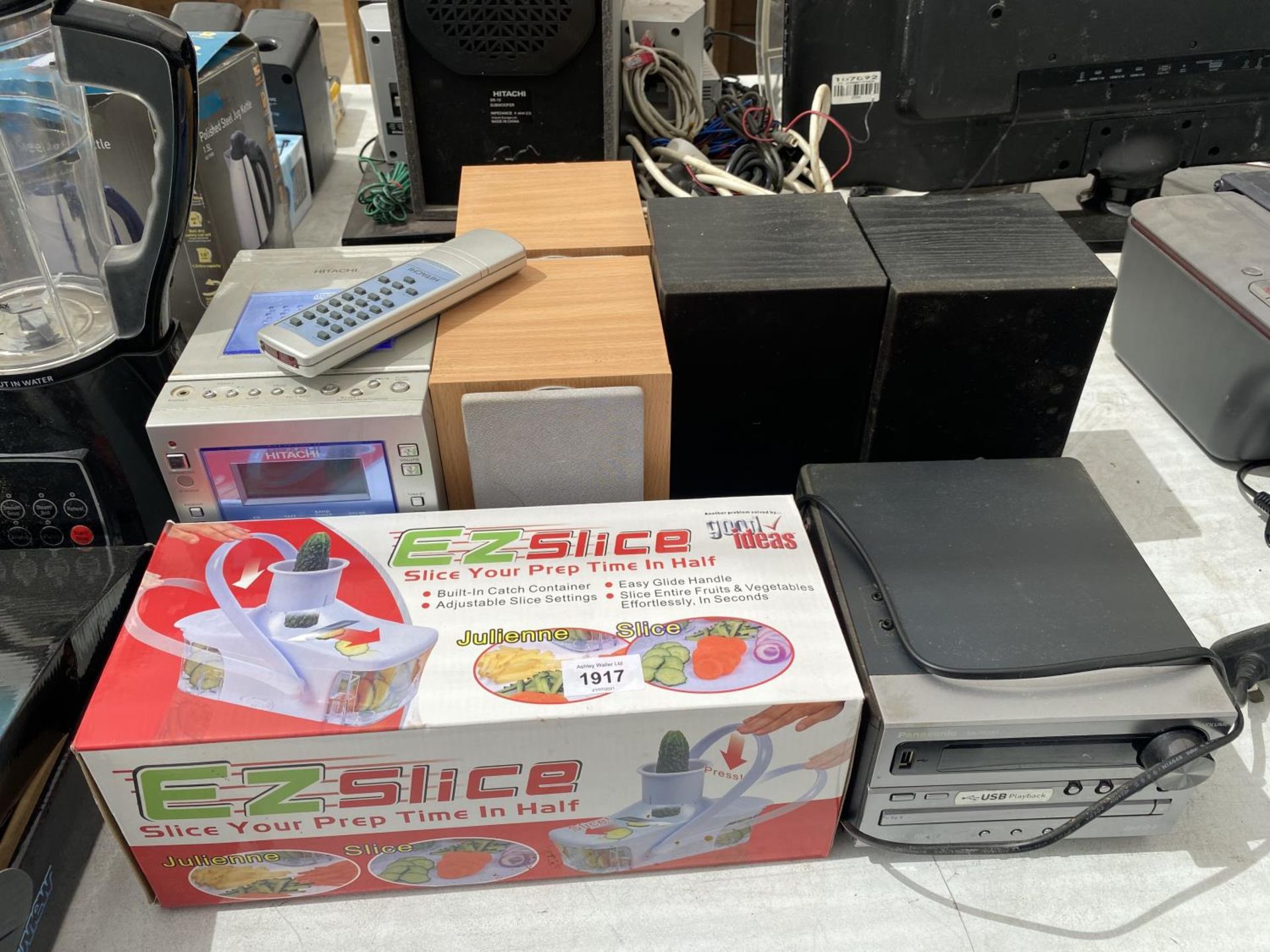 AN ASSORTMENT OF ITEMS TO INCLUDE A EZSLICE, HITACHI STEREO AND FURTHER SPEAKERS ETC