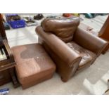 A MODERN LEATHER EASY CHAIR ON BUN FEET AND FOOTSTOOL WITH HINGED LID