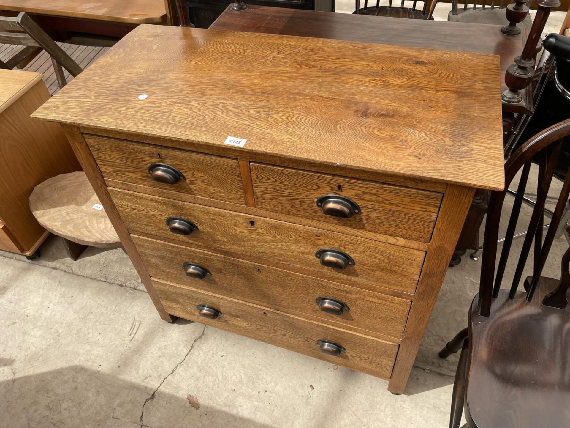A MID 20TH CENTURY OAK CHEST OF TWO SHORT AND THREE LONG DRAWERS, WITH SCOOP HANDLES, 36" WIDE