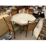 A MODERN OCTAGONAL STONE EFFECT DINING TABLE, 52" ACROSS WITH, FOUR TUBULAR METAL FRAMED CHAIRS WITH